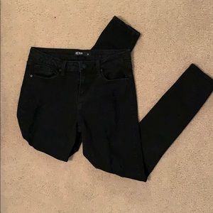 Just black distressed jeans.